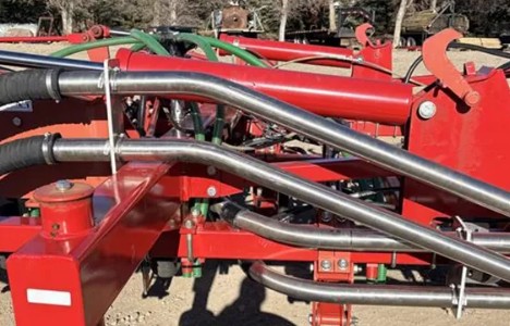Atlas stainless steel trunk lines on a seeder frame